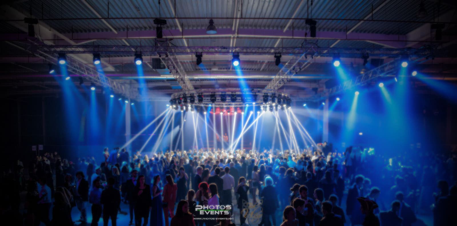 The stage beneath blue light beams